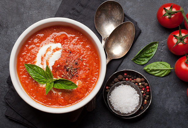 Cold gazpacho soup with ripe tomatoes, cucumber and basil